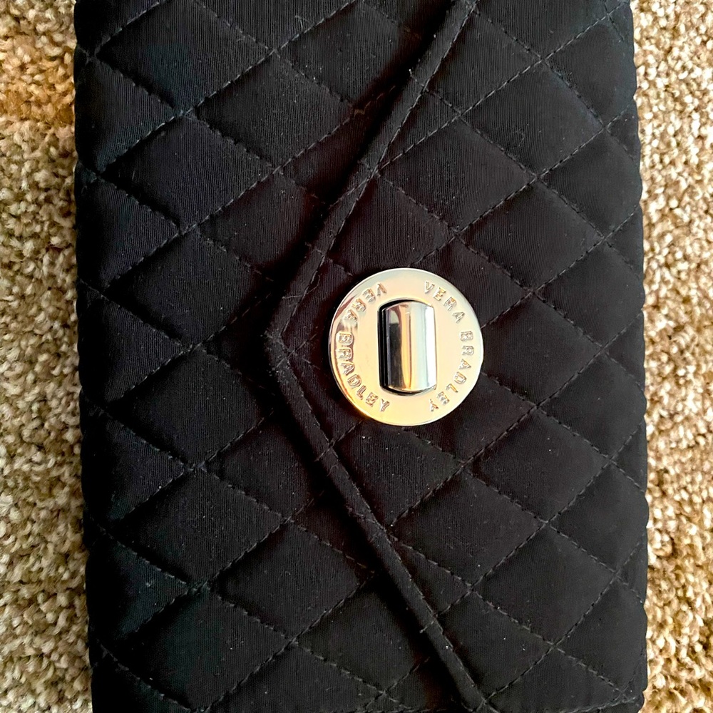 Black Vera Bradley wallet with silver accents.